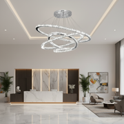 Svietiaci LED luster PRISM, krištáľ a kov, 210 W, 4 kruhy, stmievateľné, studené/teplé/neutrálne svetlo, luxusné osvetlenie